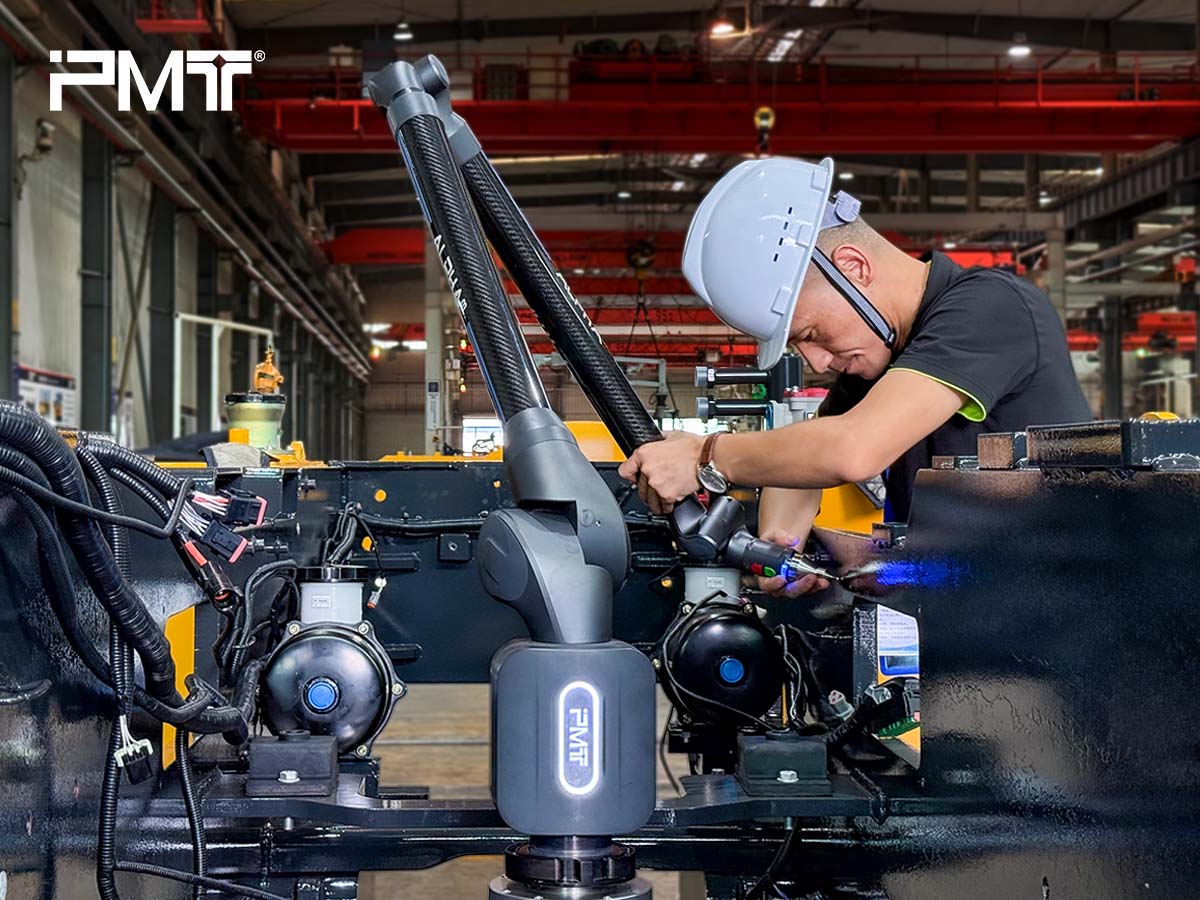 PMT portable CMM is inspecting the on-board machine hole positions